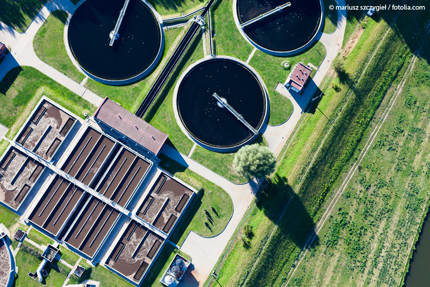 View of the outdoor facilities of a wastewater treatment plant from above as an example of a possible distribution of nanomaterials in the environment.